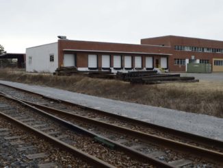 Railroad tracks and building