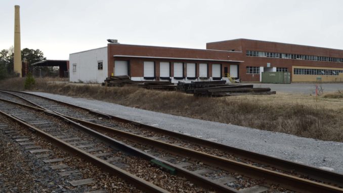 Railroad tracks and building