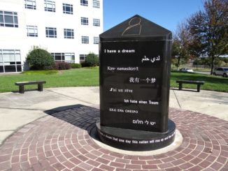 Marker at MLK Plaza with quotes from Dr. King