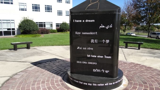 Marker at MLK Plaza with quotes from Dr. King