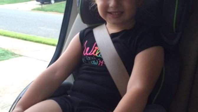 Older child in forward-facing car seat