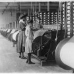 Young woman and young girl working at Loray Mill.