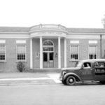 Gastonia Public Library with bookmobile in front in 1939