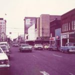 Cars driving on one-way Main Avenue in the 1970s