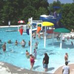 Dozens of people in the swimming pool at Lineberger Park