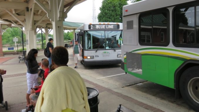 Buses at Bradley Station, one marked Blue Line