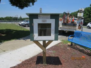 Wooden box with a door where people exchange books