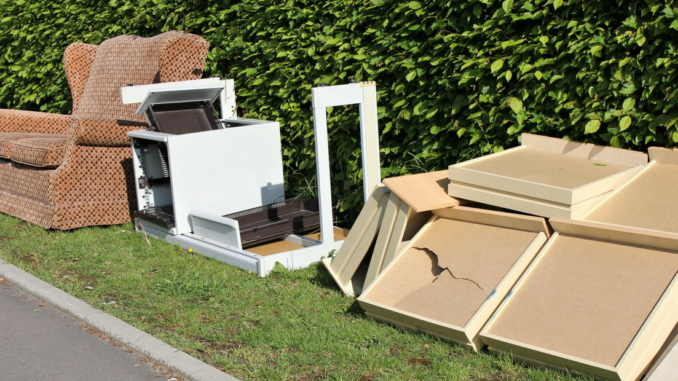 Old furniture along curb