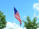 American flag against blue sky