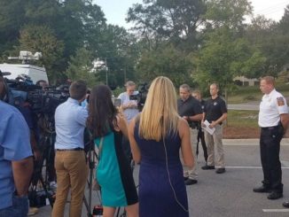 Outdoor news conference at Rankin Lake Park