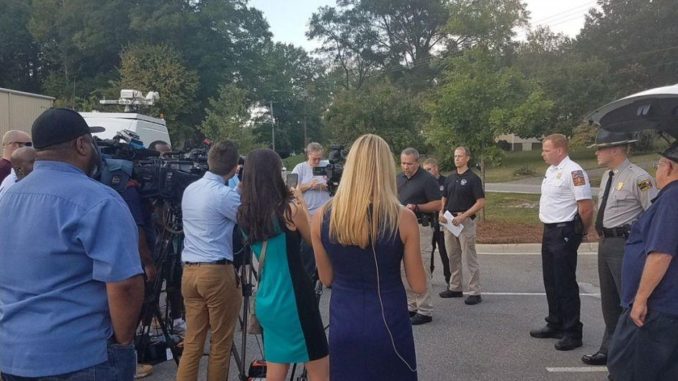 Outdoor news conference at Rankin Lake Park