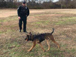 K-9 Max with ball and Officer Huneycutt
