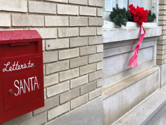 Red mailbox that says Letters to Santa at City Hall