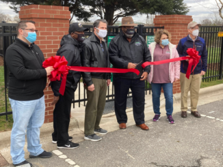 Mayor and City Council cut red ribbon at new dog park