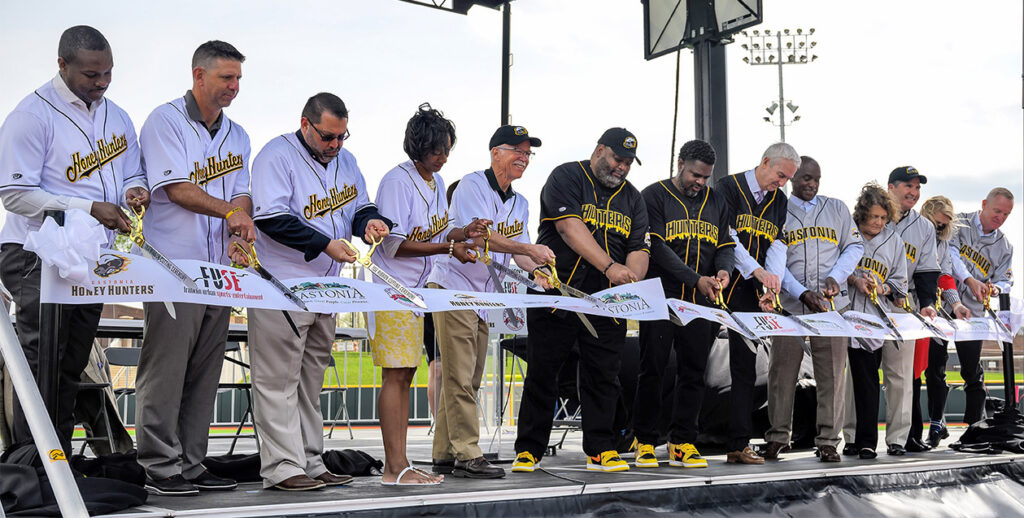 City officials cutting the ribbon at the FUSE ballpark